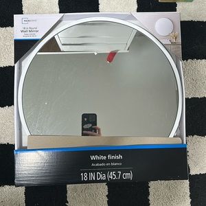 18 inch wall mirror, round with white trim. Unopened, never touched